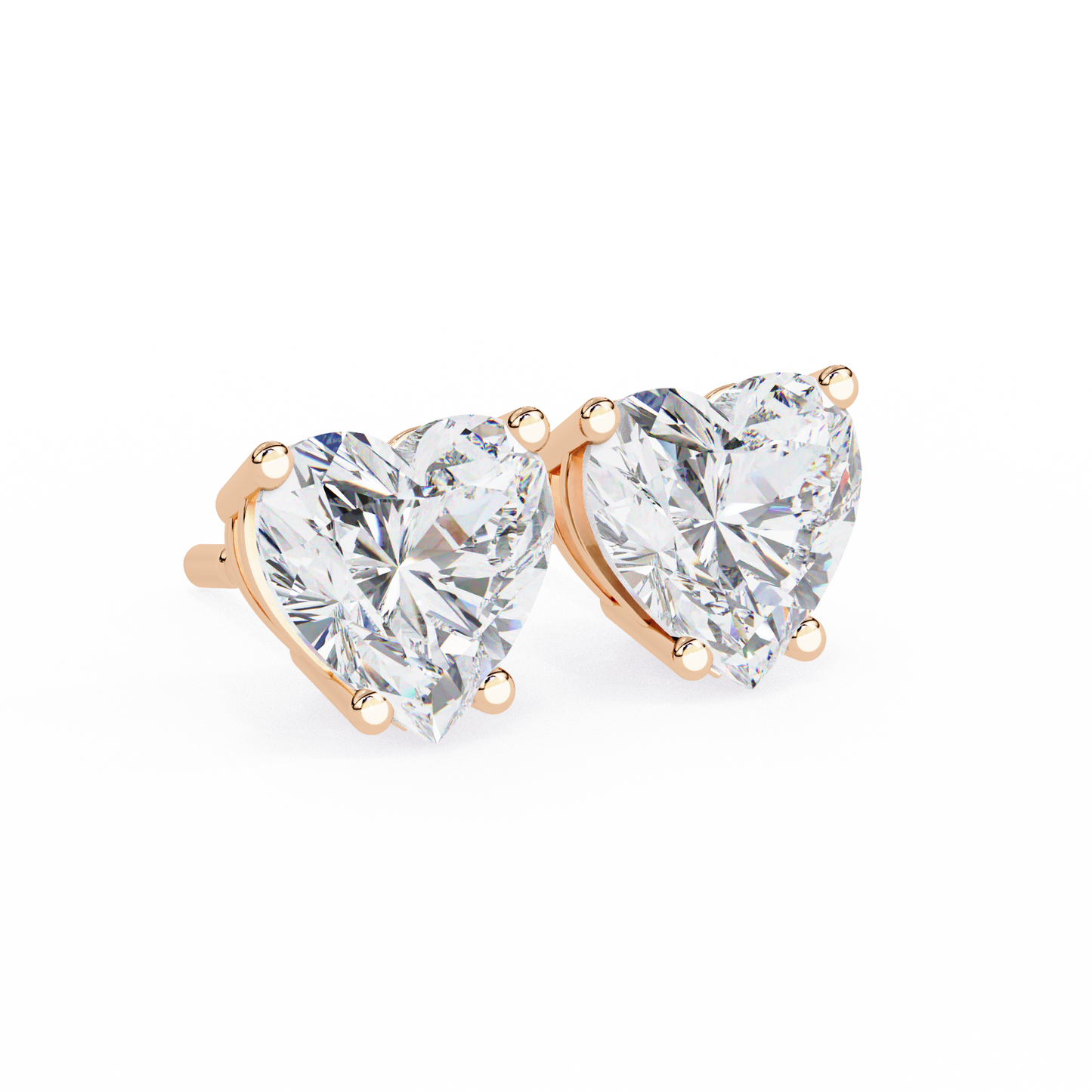 0.50 ct Heart Solitaire Studs.