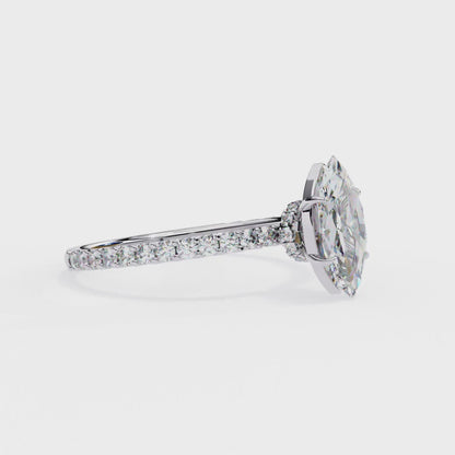 0.50 ct Solitaire Marquise ring with side diamonds.